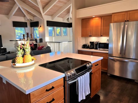 Open-concept kitchen and living room area is ideal for extended family vacations