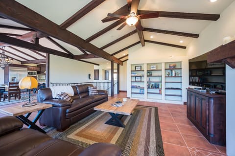 High ceilings, open concept living area.