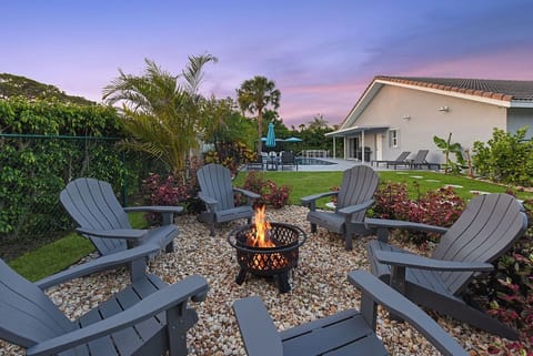 Fire pit makes evenings a pleasure in this large, private yard.
