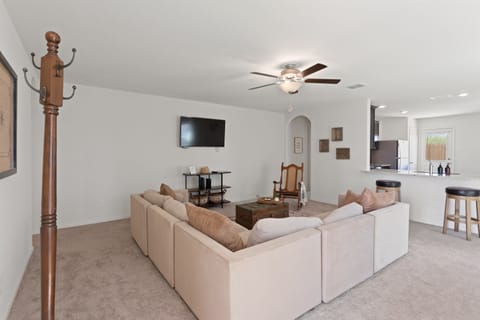 Stream your favorite movies on the Smart TV in this open-concept living area. The sectional sofa provides plenty of room for the whole group to gather after a long day of tubing the Comal River.