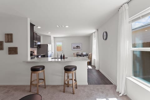 Enjoy morning coffee or a quick bite at the bar—perfect for casual meals.