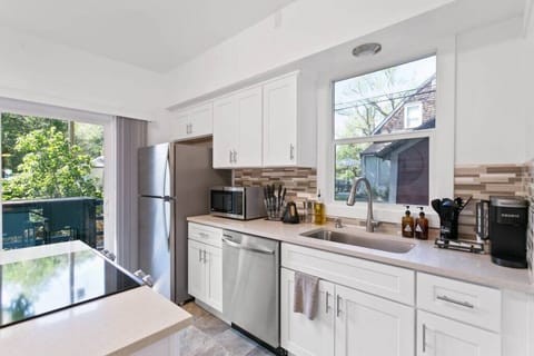 Open-concept design with quartz countertops and hand-picked finishes.