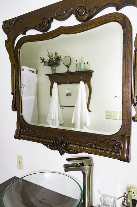 Antique mirror and towel rack.