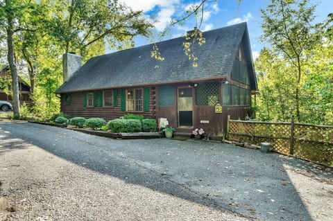 Front of cabin, enclosed front porch and parking area