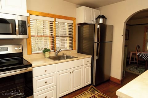 New Ap!pliances in this kitchen will everything you will need.  Fully Stocked