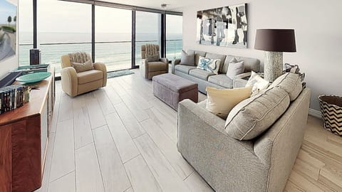 Living room w/floor to ceiling windows offer views of Mission Beach to La Jolla!