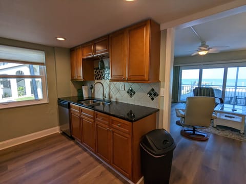 Full size kitchen, dishwasher, cup, plate, etc...