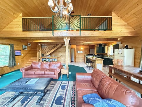 Spacious living room with fireplace for you to enjoy.