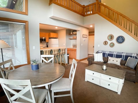 Upstairs living room and kitchen - Newly updated with all new furnishings and amenities.  Sleeper sofa in upstairs and downstairs dens.