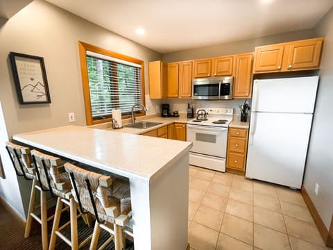 Upstairs kitchen - Everything you need to dine and cook