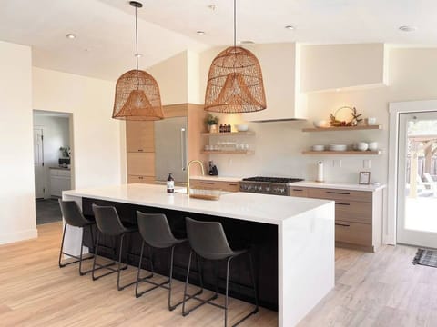 Brand new gourmet kitchen, featuring high-end appliances. 