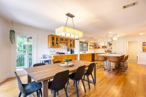 Dining Room- There is a wood folding table which can seat additional 4 guests for larger family meals. 