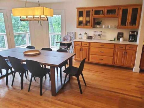 Start your morning off fresh at our Waffle & Coffee Bar For larger family meals- we have a folding table which seats 4 that can be set up between the dining table and the kitchen island. 