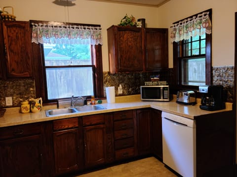 Kitchen with Full-Sized appliances & all the cooking essentials. 