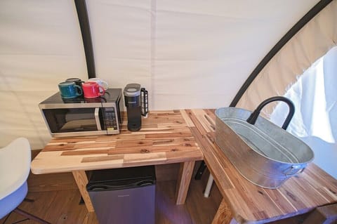 Equiped with mini-fridge, microwave, sink, and keurig coffee machine. (complimentary coffee provided)