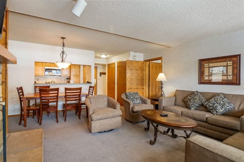 Furniture, Indoors, Living Room, Couch, Table