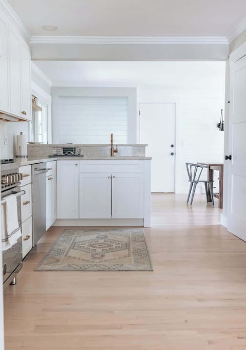 recently renovated, coastal, whites, lights, open concept with large yard!