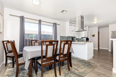 Sliding Glass Door off Dining Area to backyard.