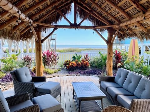 Relax beneath the palapa in the fully fenced backyard.