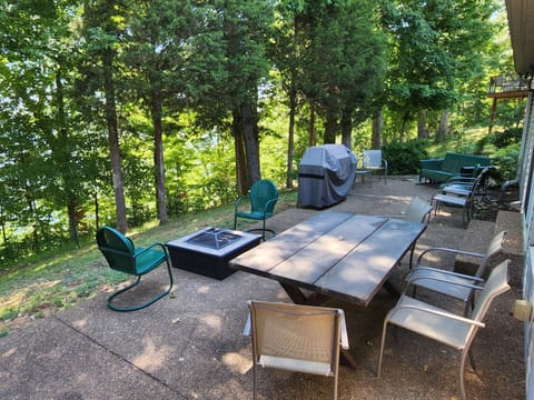 BBQ, firepit, lots of seating overlooking the lake