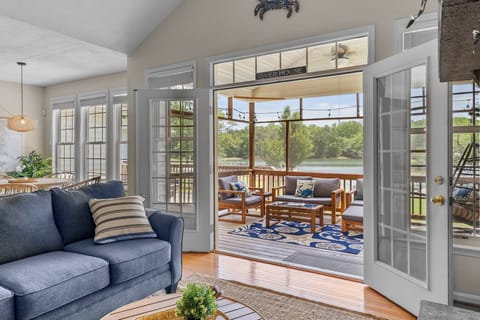 Living room opens to screened porch!