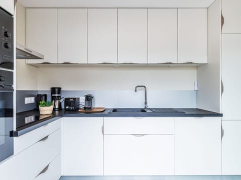 Cabinetry, Kitchen Sink, Countertop, White, Kitchen Appliance, Kitchen Stove, Sink, Home Appliance, Building, Kitchen