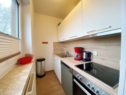 Kitchen with oven and herd