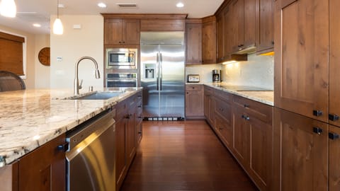 Gourmet kitchen with a great assortment of spices, oils and essentials provided