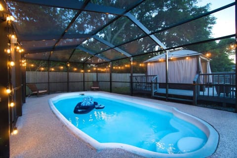 Relax and unwind at this private screened-in pool and patio, overflowing with Florida vibes~This home is recommended for swimmers only>>