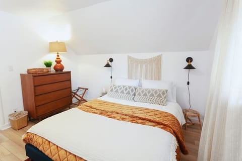 Luxurious bedding, and power strip to charge your phone. 