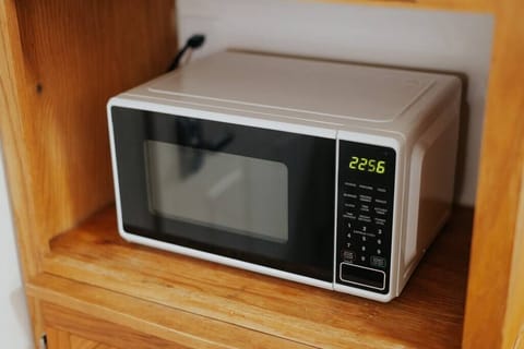 A modern microwave for convenient cooking during your stay.