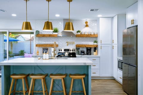 Kitchen alternate view with island and modern appliances