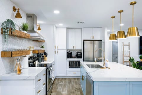 Kitchen alternate view with island and modern appliances