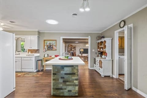 View from dining room to spacious kitchen.