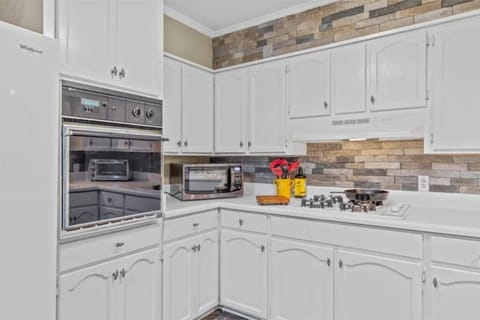 Wall oven, microwave, gas stove top. Plenty of cooking oils & spice.