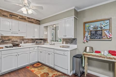 Pretty view of the sun room from the kitchen sink