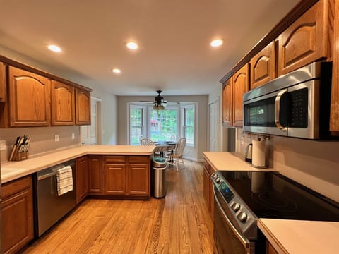 Kitchen that connects to breakfast nook and dining room