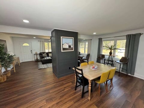 Open living area with smart TV and fireplace—gather in comfort.