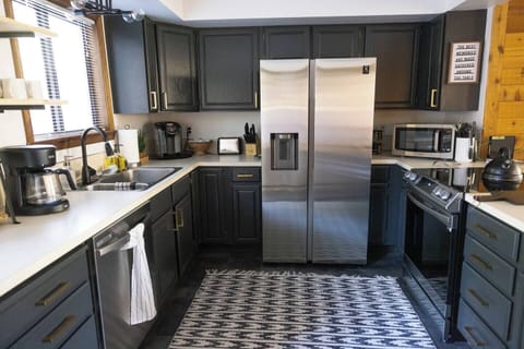 Bright, stylish kitchen dressed in chic gray tones