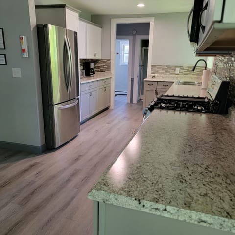 Fully equipped kitchen with all new appliances for all your culinary needs.