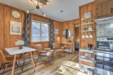 Your view of the open-concept and well-furnished cottage upon entering