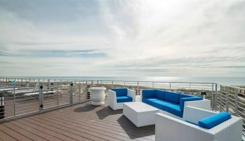Beach club -Pool deck seating or walk downstairs to the white sand beach of Gulf