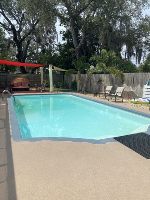 Large pool with tons of seating areas for enjoying some fun in the sun