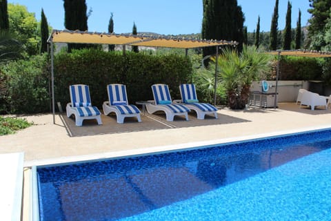 Outdoor shared pool with salt water. Not heated. 