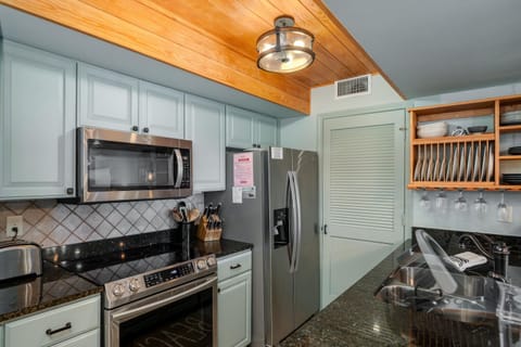 A cooking kitchen (manual button lights under the counter for extra counter top lighting)