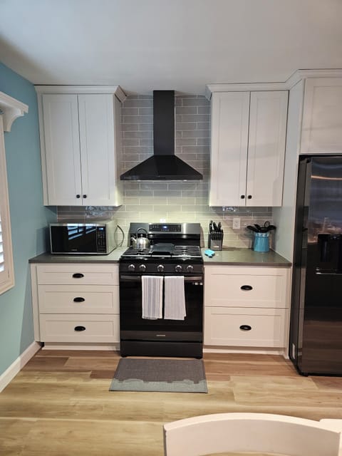 Designer Kitchen with Pans, and utensils