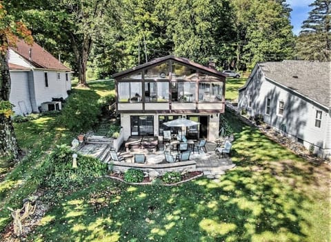 Lakeside view of house (pictured with previous patio furniture)