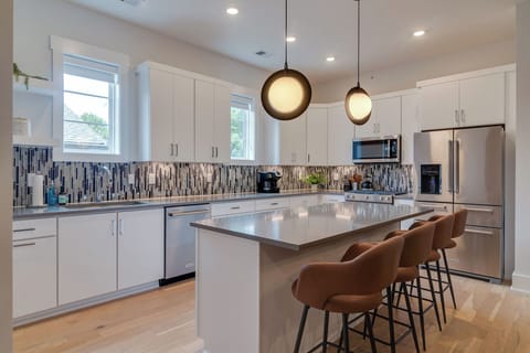Bar stools add the perfect perch for easy dining, conversation, or a cozy start to the day.