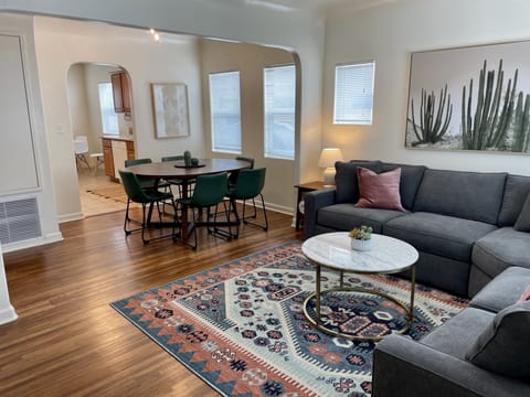Living and Dining areas blend - a great space to gather in