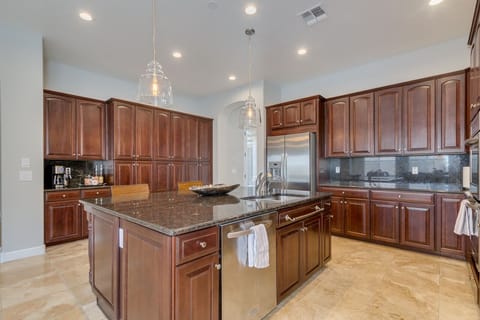 Kitchen with gas stove, double ovens, fully stocked with essentials